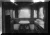 Thumbnail image of the inside of the more stylish but unknown caravan type. Click here for a larger image that will open a new window. 