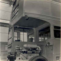 Small image of Routemaster RM3 under construction. Click here for a larger image that will open a new window. engine_to_bulkhead_and_cab_ns.jpg (91123 bytes)