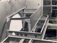 Small image of Routemaster RM3 under construction. Click here for a larger image that will open a new window. longitudinal_seat_riser_footstool_end_os.jpg (75205 bytes)