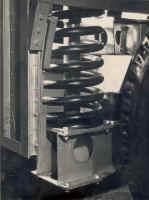 Small image of Routemaster RM3 under construction. Click here for a larger image that will open a new window. rear_spring_and_bump_stop_os.jpg (65533 bytes)