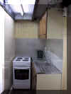 Thumbnail image of Pentre Cottage galley kitchen. Click here for a larger image.
