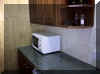 Thumbnail image of Pentre Cottage galley kitchen. Click here for a larger image.