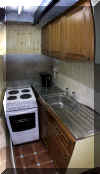 Thumbnail image of Pentre Cottage galley kitchen. Click here for a larger image.